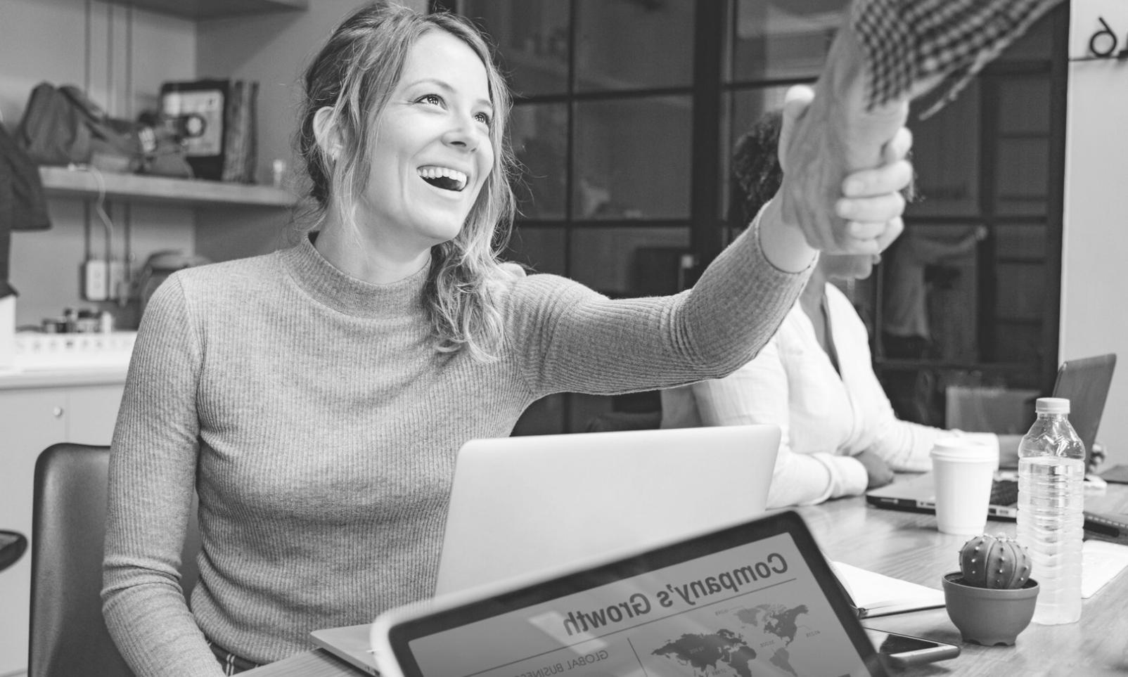 Students engaged in collaborative budgeting workshop session